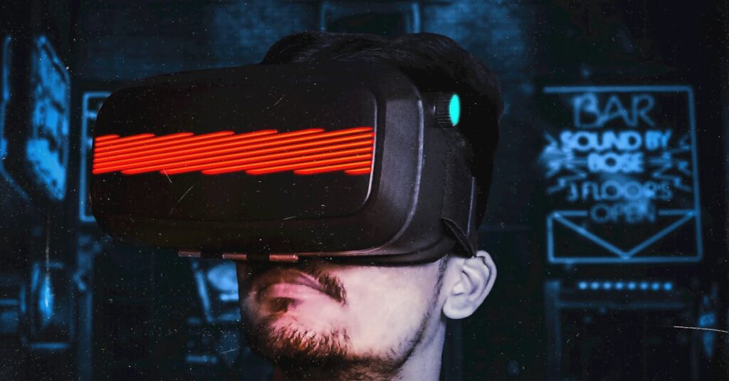 Patrick Balahan Young man immersed in a virtual reality experience using a VR headset, showcasing futuristic tech in a gaming environment.